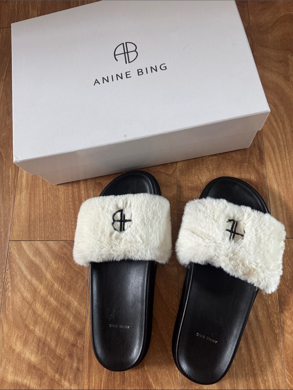 Anine Bing Black Footbed White Faux-Fur Logo Slide Sandals